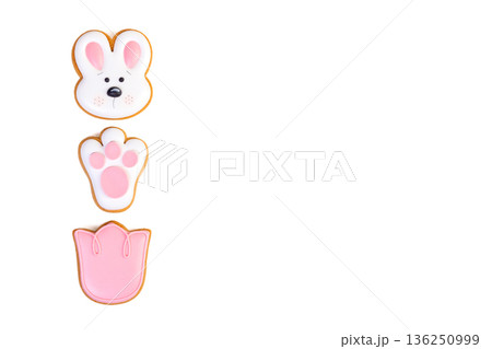 Gingerbread Easter cookies with colorful icing in different shapes 136250999