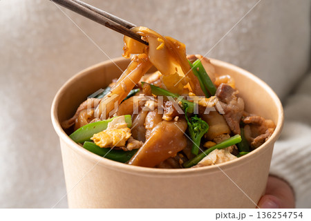 Thai food (Pad See Ew), Stir-fried rice noodles with soy sauce, pork, egg, and kale 136254754