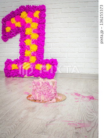 moscow, russia, 31.08.2015 A pink cake with a pink number 1 on it moscow, russia, 31.08.2015 A pink cake with a pink number 1 on it 136255373