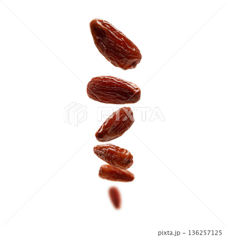 A Variety of Assorted Dried Dates Presented on a Clean White Background for Viewing 136257125