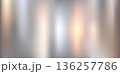 Silver brushed stainless steel texture with vertical gradient color reflections 136257786