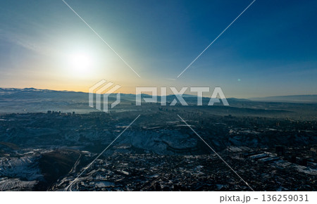 A beautiful blue sky with a sun in the background A beautiful blue sky with a sun in the background 136259031