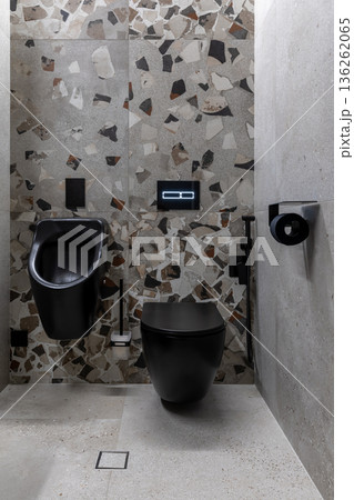 Modern Black Toilet and Urinal with Terrazzo Tiles 136262065