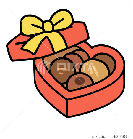 Heart shaped box with yellow ribbon, filled with assorted chocolate candy, romantic gift Heart shaped box with yellow ribbon, filled with assorted chocolate candy, romantic gift 136265092