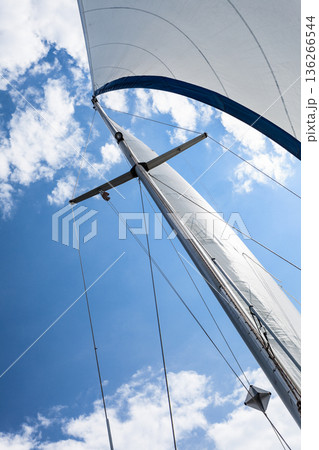Detailed closeup of sail on sailboat Detailed closeup of sail on sailboat 136266544