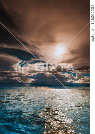 Beautiful sunset on the ocean sea Beautiful sunset on the ocean sea 136266583