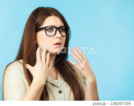 Shocked and surprised woman 136267109