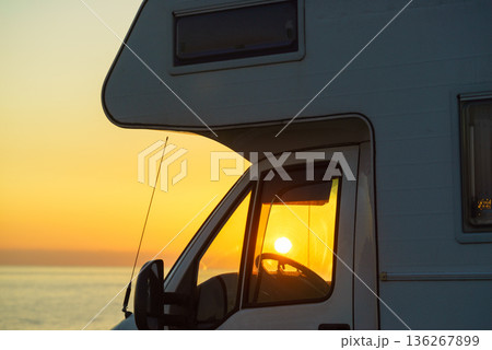 Caravan on coast at sunset Caravan on coast at sunset 136267899