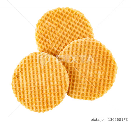 Three dutch stroopwafels with caramel filling isolated on white 136268178