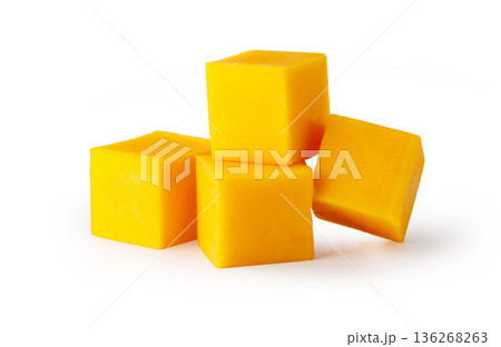 Five yellow cheddar cheese cubes on white background Five yellow cheddar cheese cubes on white background 136268263