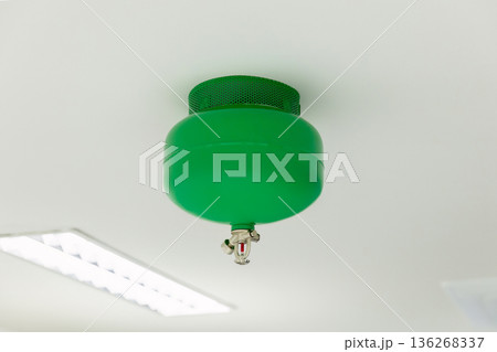 Automated Fire Extinguisher set in building.  136268337