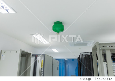 Automated Fire Extinguisher set in building. Automated Fire Extinguisher set in building. 136268342