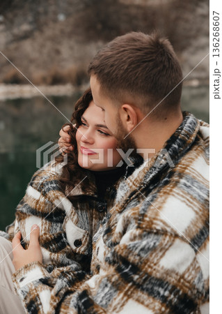 Couple enjoys a moment together by the water on Valentines Day Couple enjoys a moment together by the water on Valentines Day 136268607