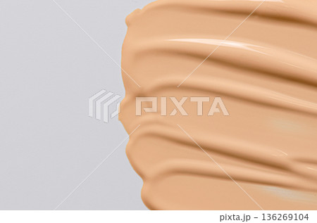 Skin foundation or makeup base. Cosmetic product. 136269104