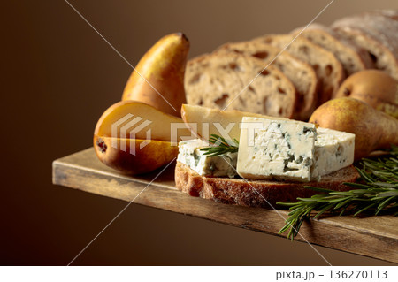 Sandwich with blue cheese, pears, and rosemary. 136270113