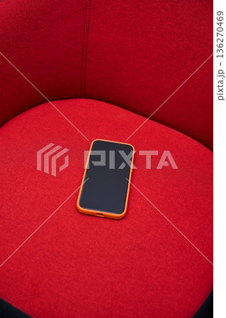 Smartphone on Red Fabric 136270469