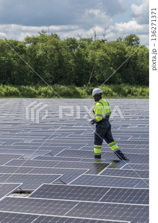 Engineer Checking and working setup Floating solar panels or solar cell Platform system on the lake. Engineer Checking and working setup Floating solar panels or solar cell Platform system on the lake. 136271371