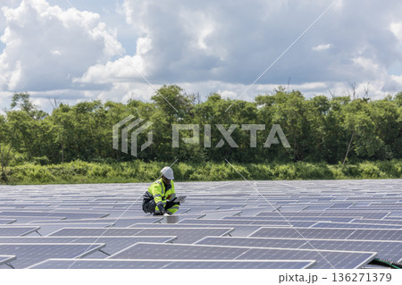Engineer Checking and working setup Floating solar panels or solar cell Platform system on the lake.  136271379
