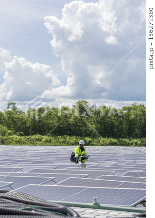 Engineer Checking and working setup Floating solar panels or solar cell Platform system on the lake.  136271380
