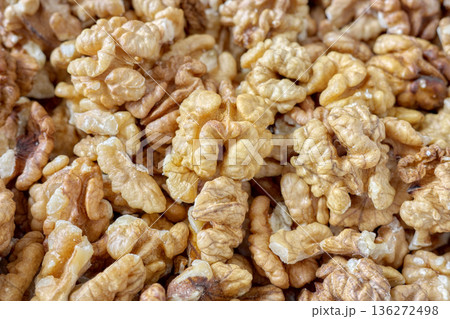 Photo of natural, freshly shelled walnuts, selective focus. 136272498