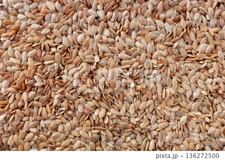 Close up photo of flax seeds, selective focus. Close up photo of flax seeds, selective focus. 136272500