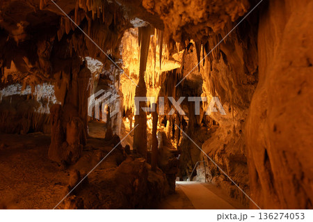 Stalactites and stalagmites naturally formed in Castellana Caves, Puglia, Italy 136274053