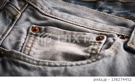 Denim jeans pocket with rivets close-up 136274452