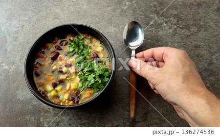Red bean soup with potatoes, tomatoes, paprika, carrot, and bacon. 136274536