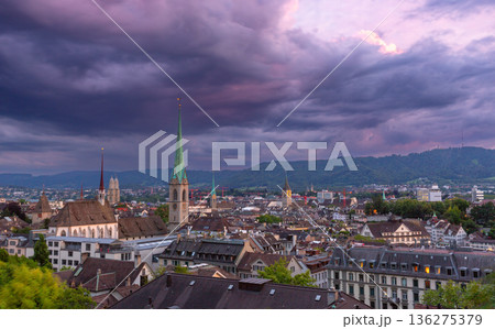 Dramatic Evening Sky over Zurich Old Town Rooftops and Church Towers 136275379