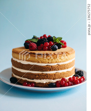 Gourmet Layer Cake with Fresh Berries. Stylish Cake. Fruit Topped Layer Cake. AI Generated. 136275752