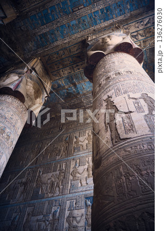 Ancient Egyptian temple columns with hieroglyphs 136276030