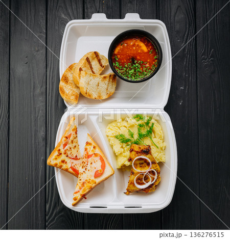 Takeout solyanka soup with mashed potatoes, chicken and cheese toast 136276515