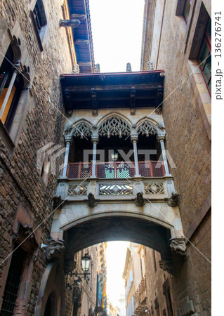 The Pont del Bisbe (Bishop's Bridge), a Gothic bridge built in 1928 connecting the Palau de la Generalitat with the House of Canons in Gothic Quarter of Barcelona, Spain 136276741