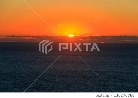 View of the Atlantic Ocean from Cabo da Roca at sunset. Cabo da Roca or Cape Roca is westernmost cape of mainland Portugal, continental Europe and the Eurasian land mass 136276769