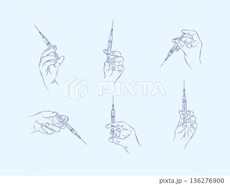 Hand holding a syringe illustrations blue 136276900