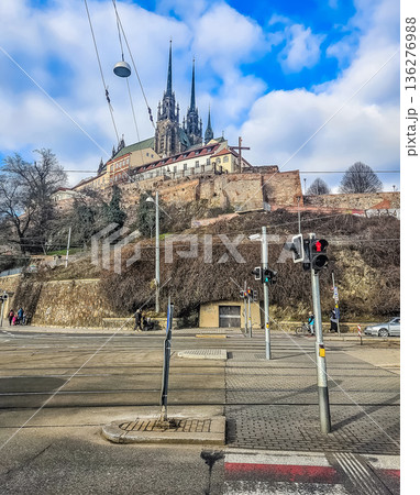 The Cathedral of St. Peter and Paul on Petrov hill in Brno, viewed from a city street with tram tracks. 136276988
