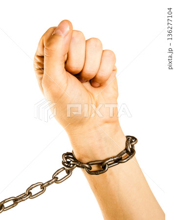 Chained man hands with chain around wrists Chained man hands with chain around wrists 136277104