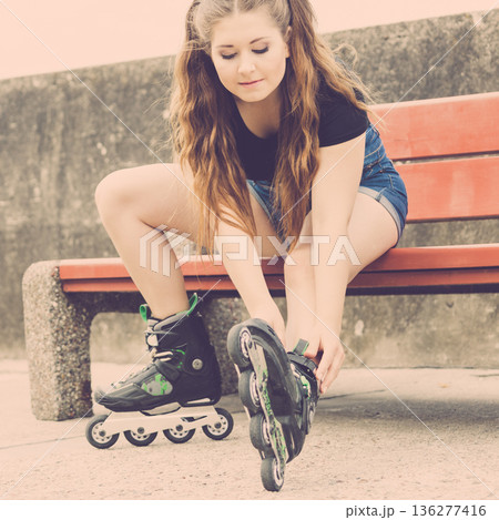 girl with roller skates outdoor girl with roller skates outdoor 136277416