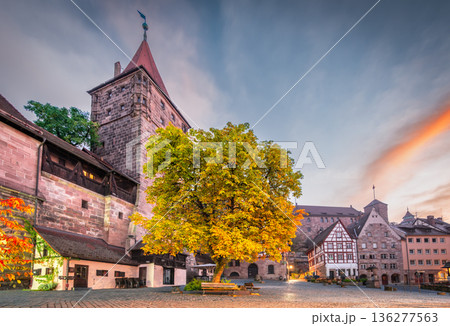 Nuremberg, Germany. Tiergartnertor, historical Kaiserburg, morning twilight. 136277563