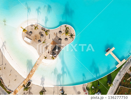 Aerial drone view artificial beach lagoon island vacation resort Aerial drone view artificial beach lagoon island vacation resort 136277750
