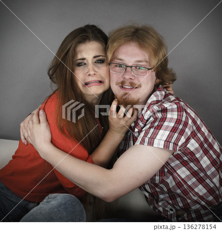 Funny couple watching horror movie Funny couple watching horror movie 136278154