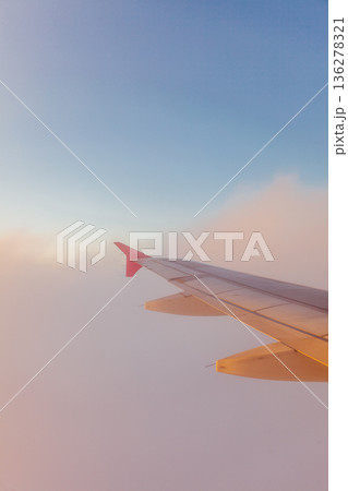 View from plane window, cloud sky 136278321