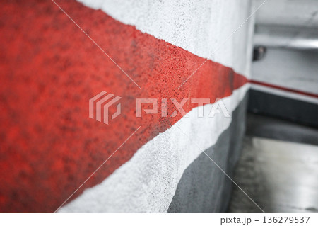 Underground Parking Line Marking with Red and White Paint Underground Parking Line Marking with Red and White Paint 136279537