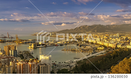 Panoramic City Harbor With Ocean Bay, Docks, and Mountain Range at Sunset in Malaga Panoramic City Harbor With Ocean Bay, Docks, and Mountain Range at Sunset in Malaga 136280030