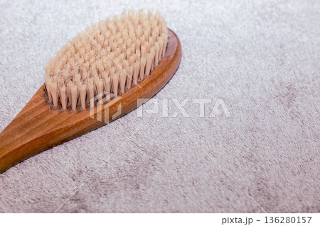 Natural bath accessories on light green towel. Natural bath accessories on light green towel. 136280157