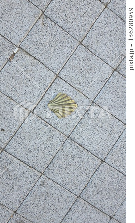 Pilgrimage pathway marker on camino de santiago for travelers and pilgrims 136280959