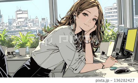 職場のデスクでパソコンに向かって仕事をしているビジネスウーマン