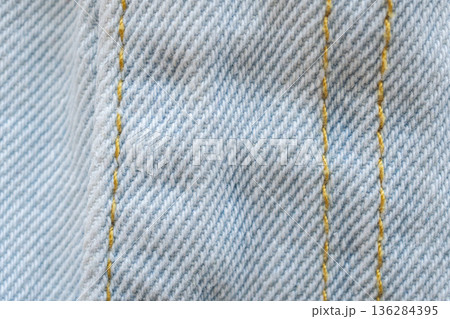 Old denim blue jeans fabric texture background close up 136284395