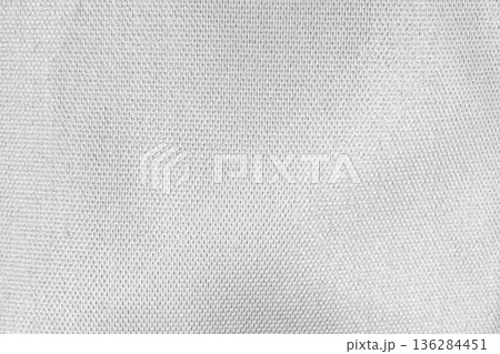 Crumpled shiny silver fabric metal texture background 136284451