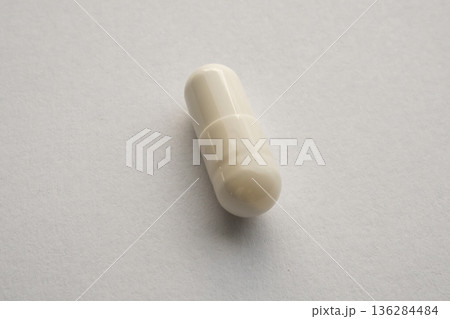 White medicine pill capsule on white background White medicine pill capsule on white background 136284484